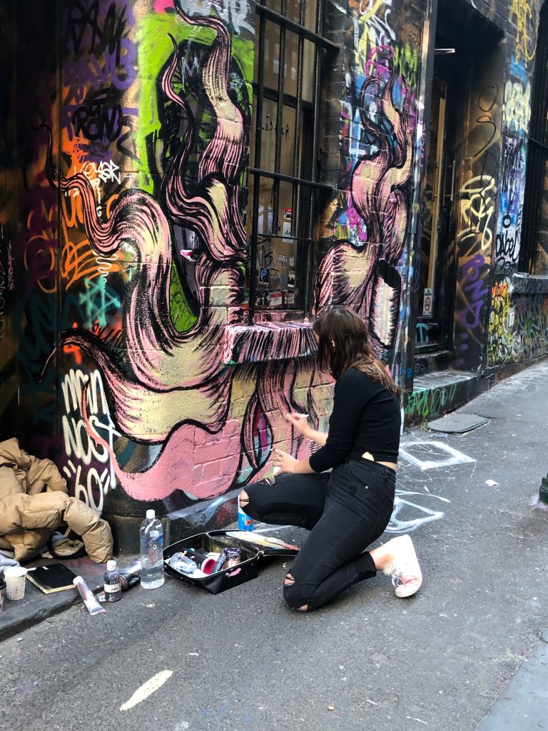A street artist working in Melbourne, Australia